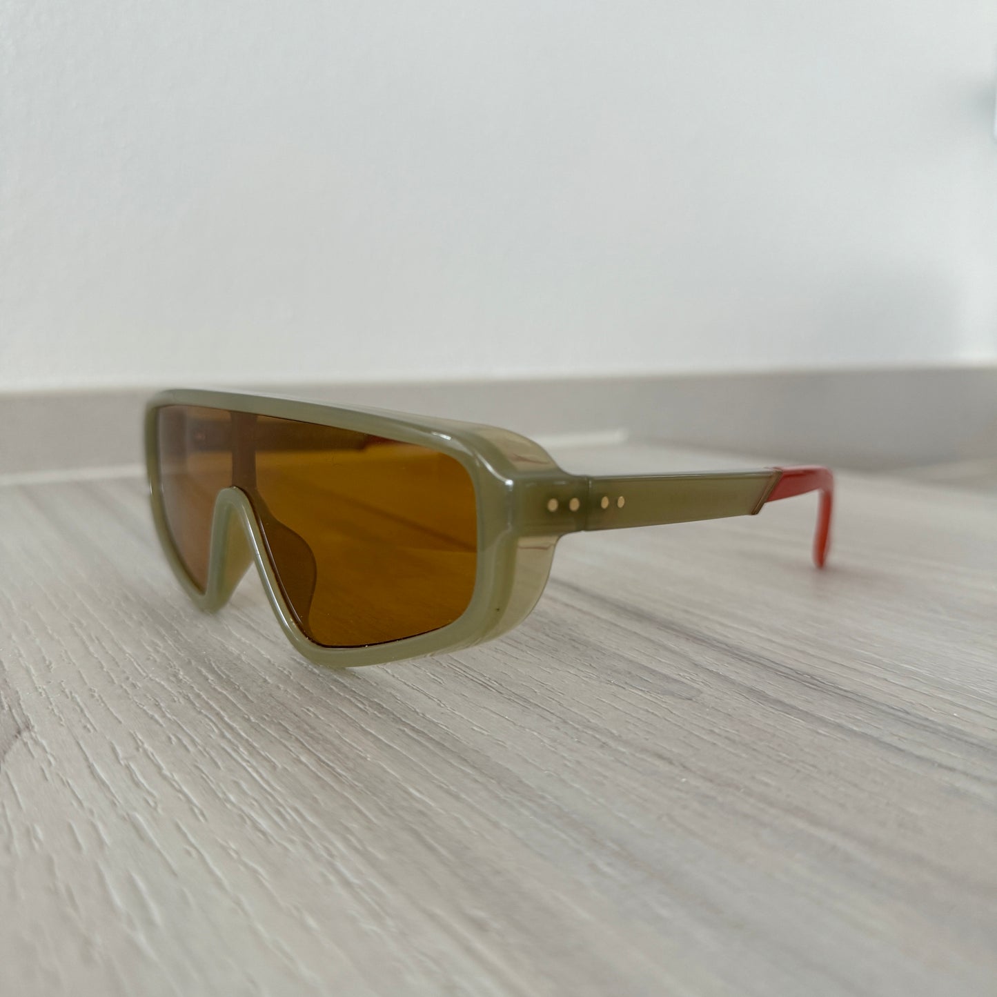 green sport sunglasses